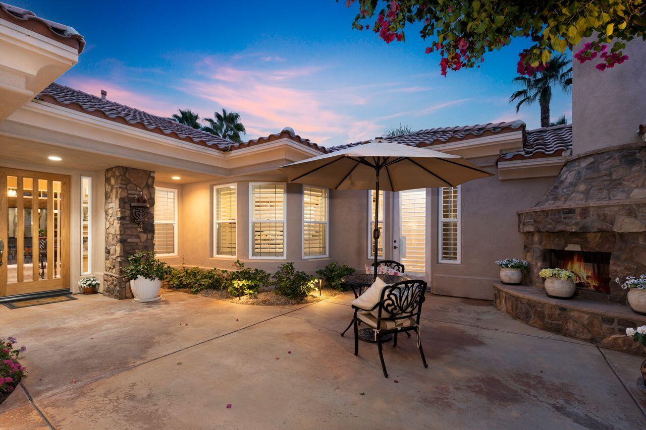 20 Vista Encantada Rancho Mirage, CA 92270 - Photo 32 of 37 a living room with furniture and a potted plant