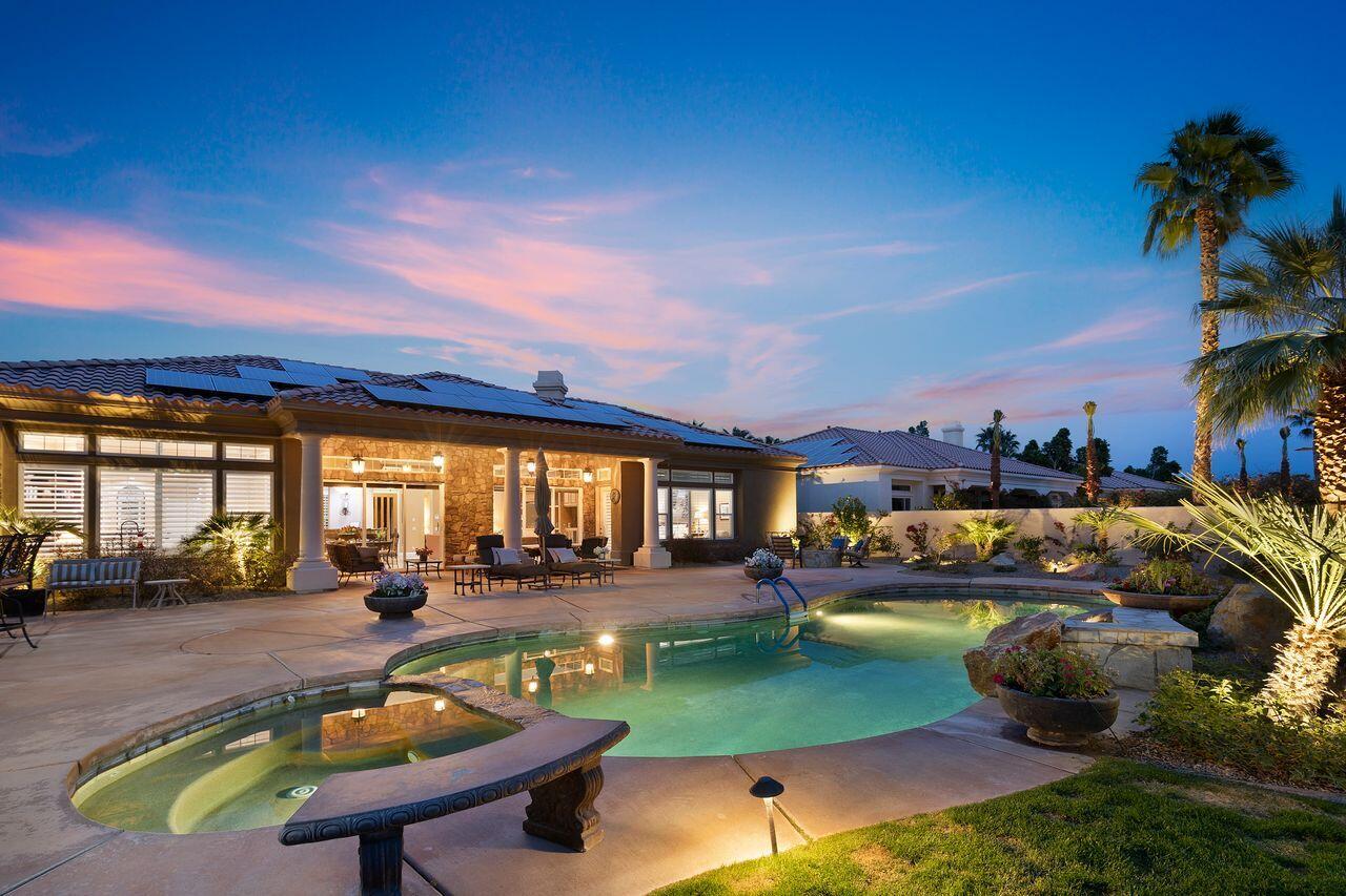 20 Vista Encantada Rancho Mirage, CA 92270 - Photo 35 of 37 a view of a swimming pool with lounge chairs