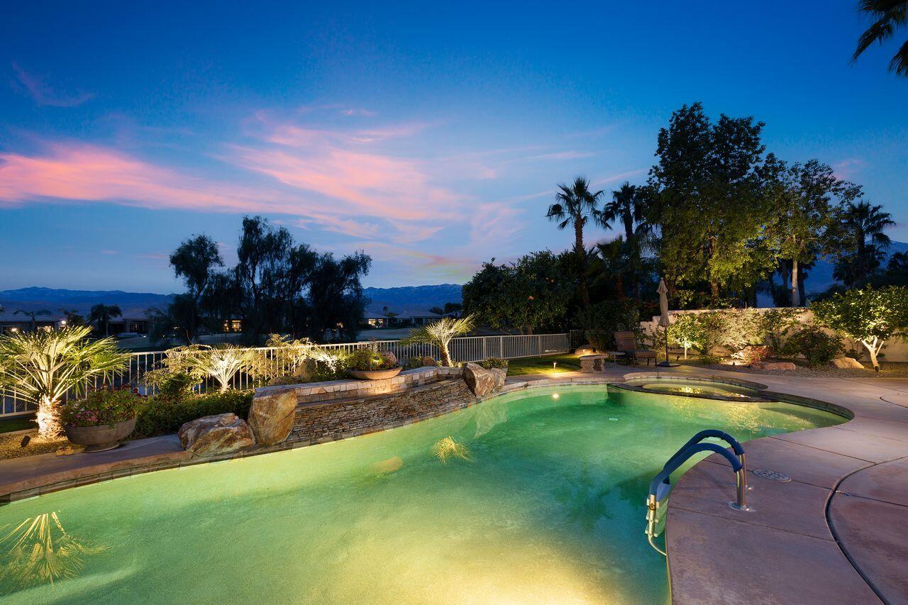 20 Vista Encantada Rancho Mirage, CA 92270 - Photo 36 of 37 a view of a swimming pool with lounge chairs