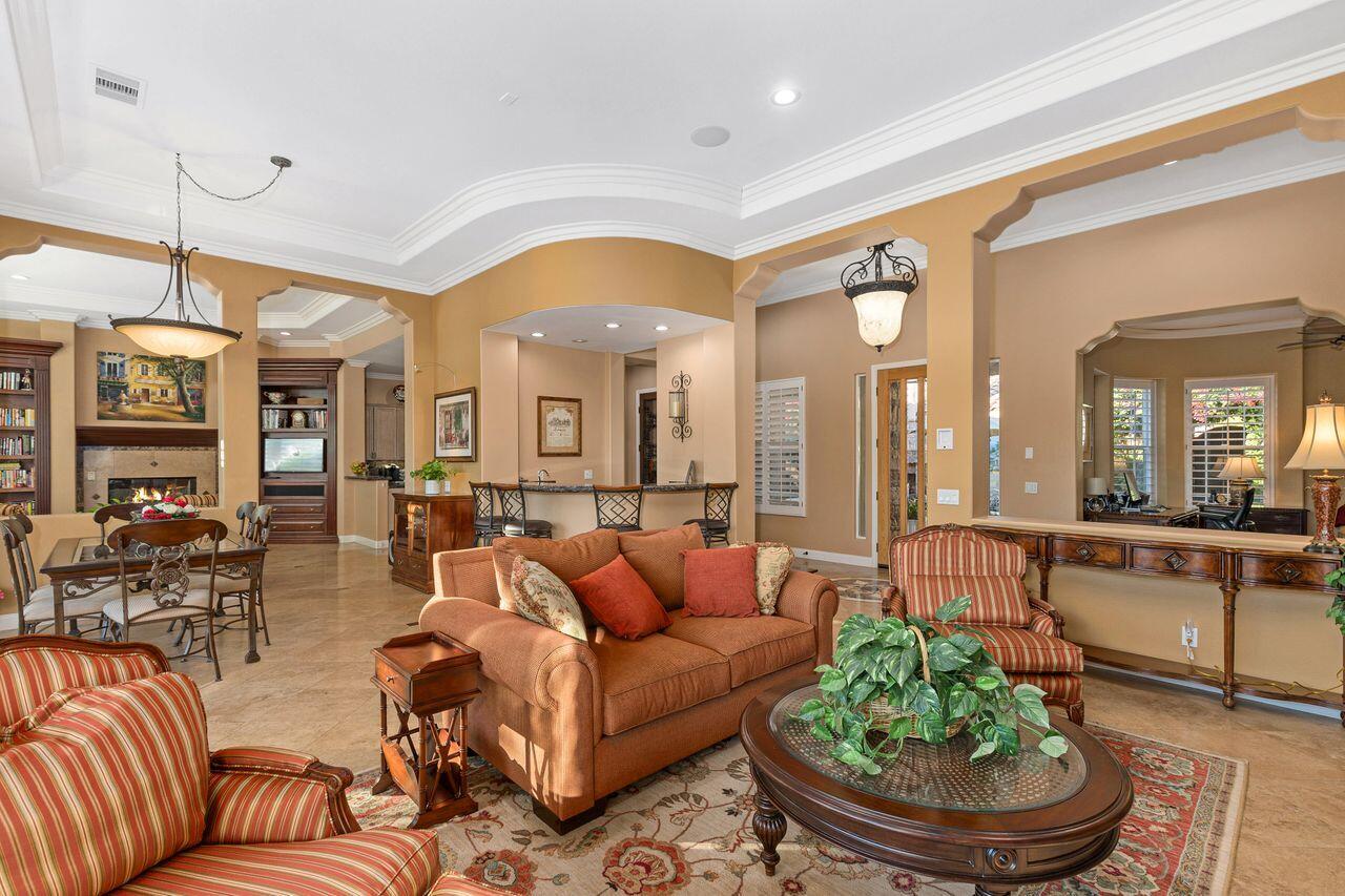 20 Vista Encantada Rancho Mirage, CA 92270 - Photo 8 of 37 a living room with furniture and a large window