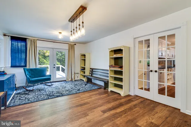 a view of a livingroom with furniture and wooden floor