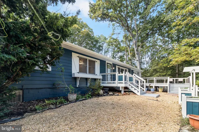 a house view with a garden space
