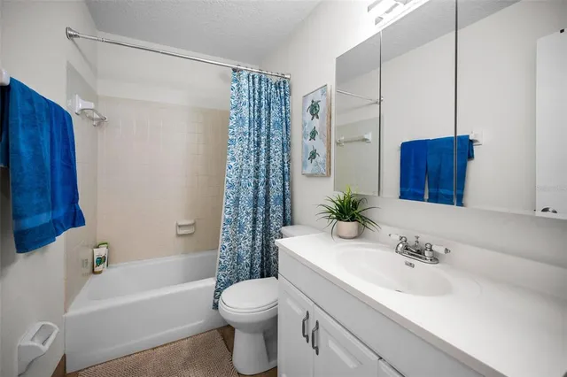 a view of swimming pool with lounge chair