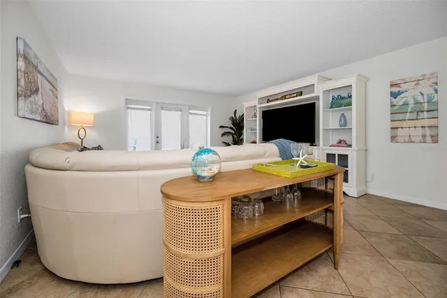 a balcony with furniture and city view