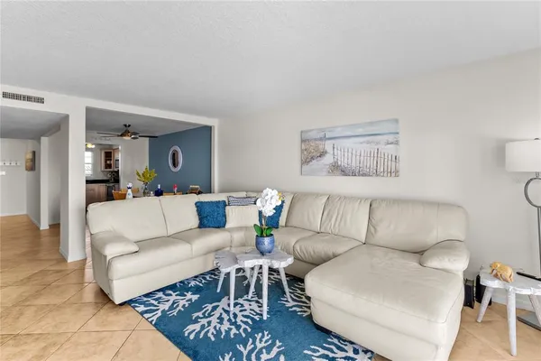a living room with furniture and a couch