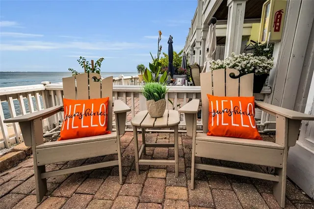 a view of a swimming pool with an ocean view
