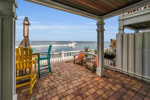 a view of a terrace with sitting area