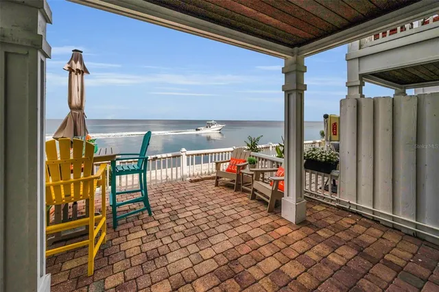 a view of a terrace with sitting area