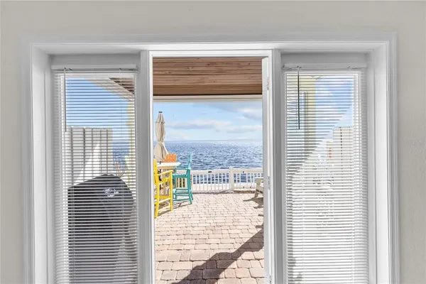 a view of a door and a window