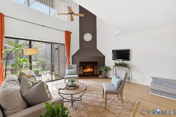 a view of an empty room with windows