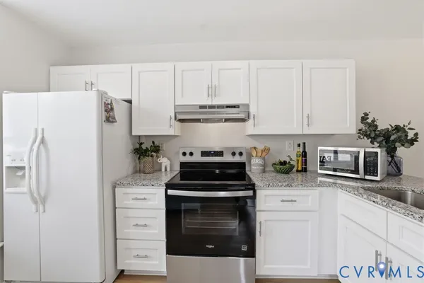 a room with furniture and window