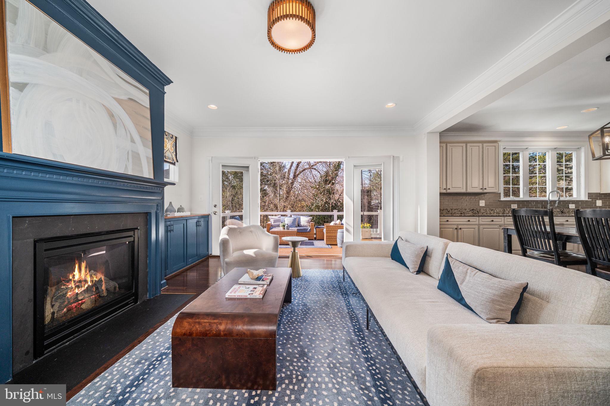 8032 Washington Road Alexandria, VA 22308 - Photo 17 of 50 a living room with furniture and a fireplace