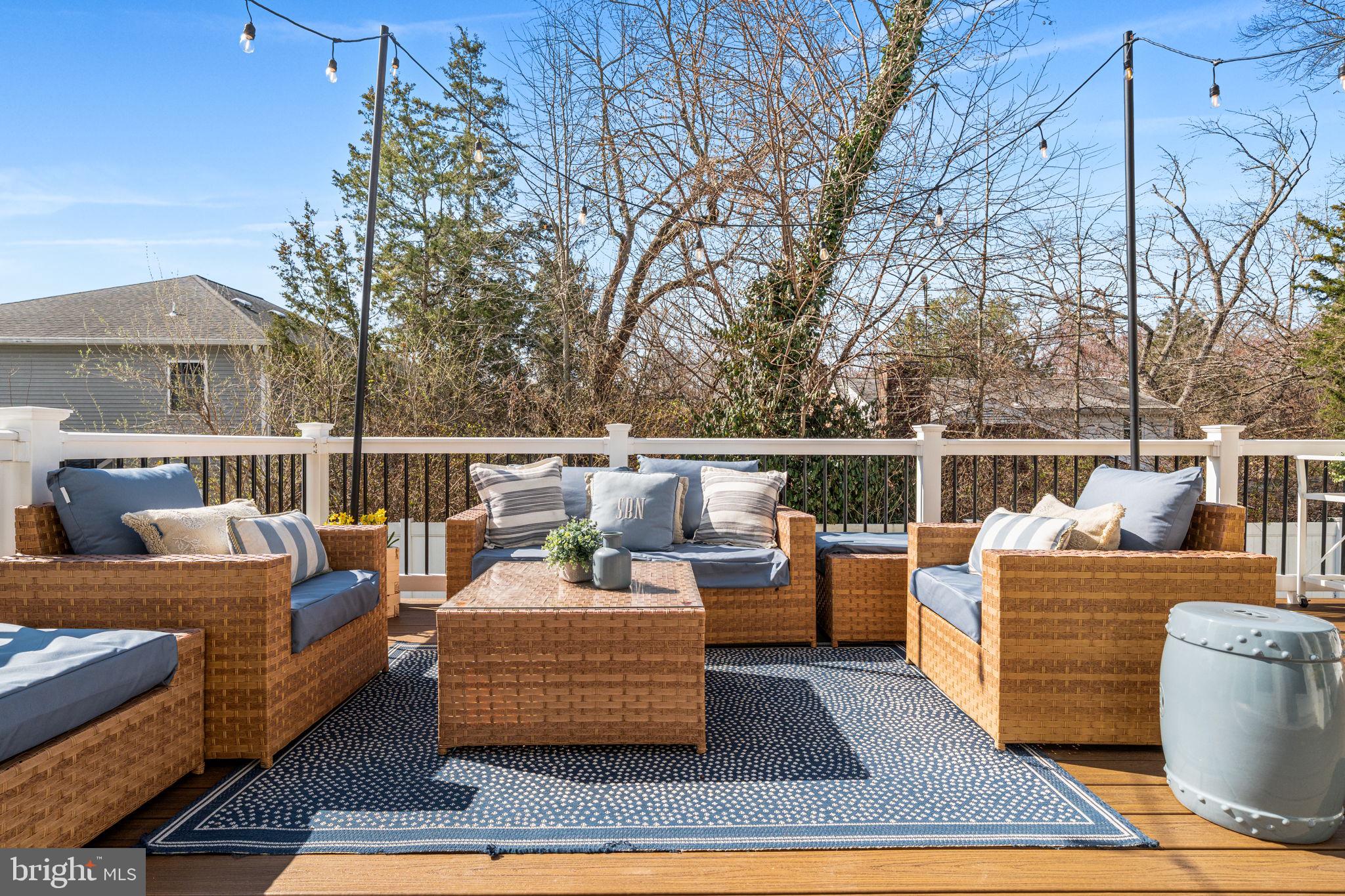 8032 Washington Road Alexandria, VA 22308 - Photo 46 of 50 a outdoor living space with patio furniture and a rug
