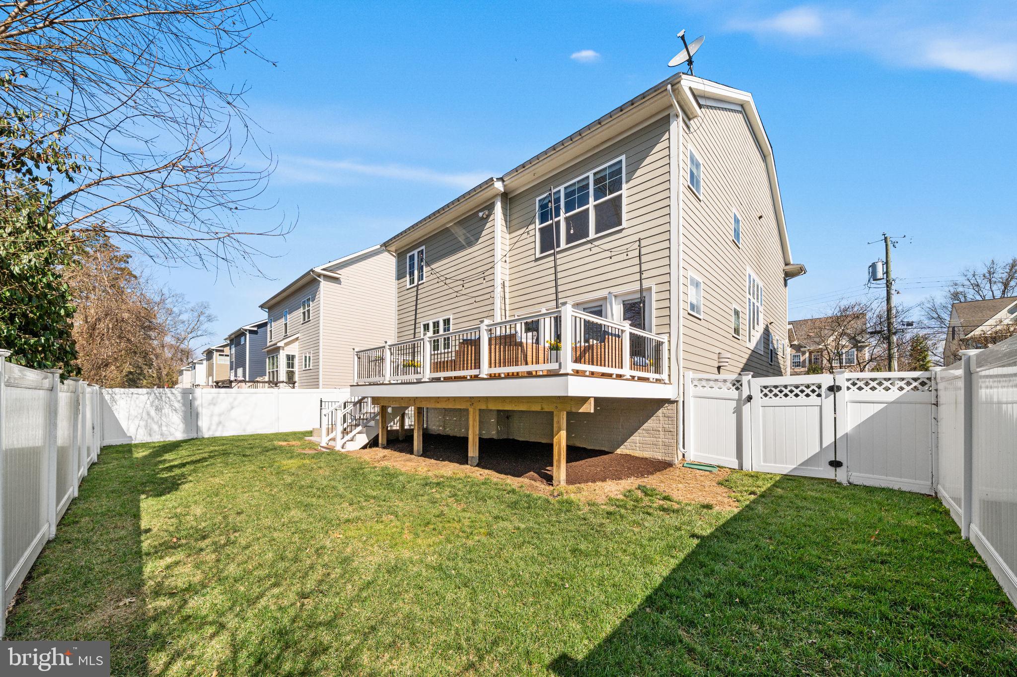 8032 Washington Road Alexandria, VA 22308 - Photo 49 of 50 a front view of a house with a garden