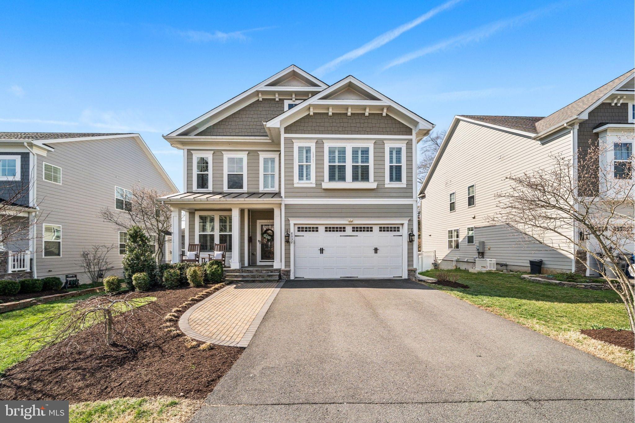 8032 Washington Road Alexandria, VA 22308 - Photo 6 of 50 a front view of a house with a yard