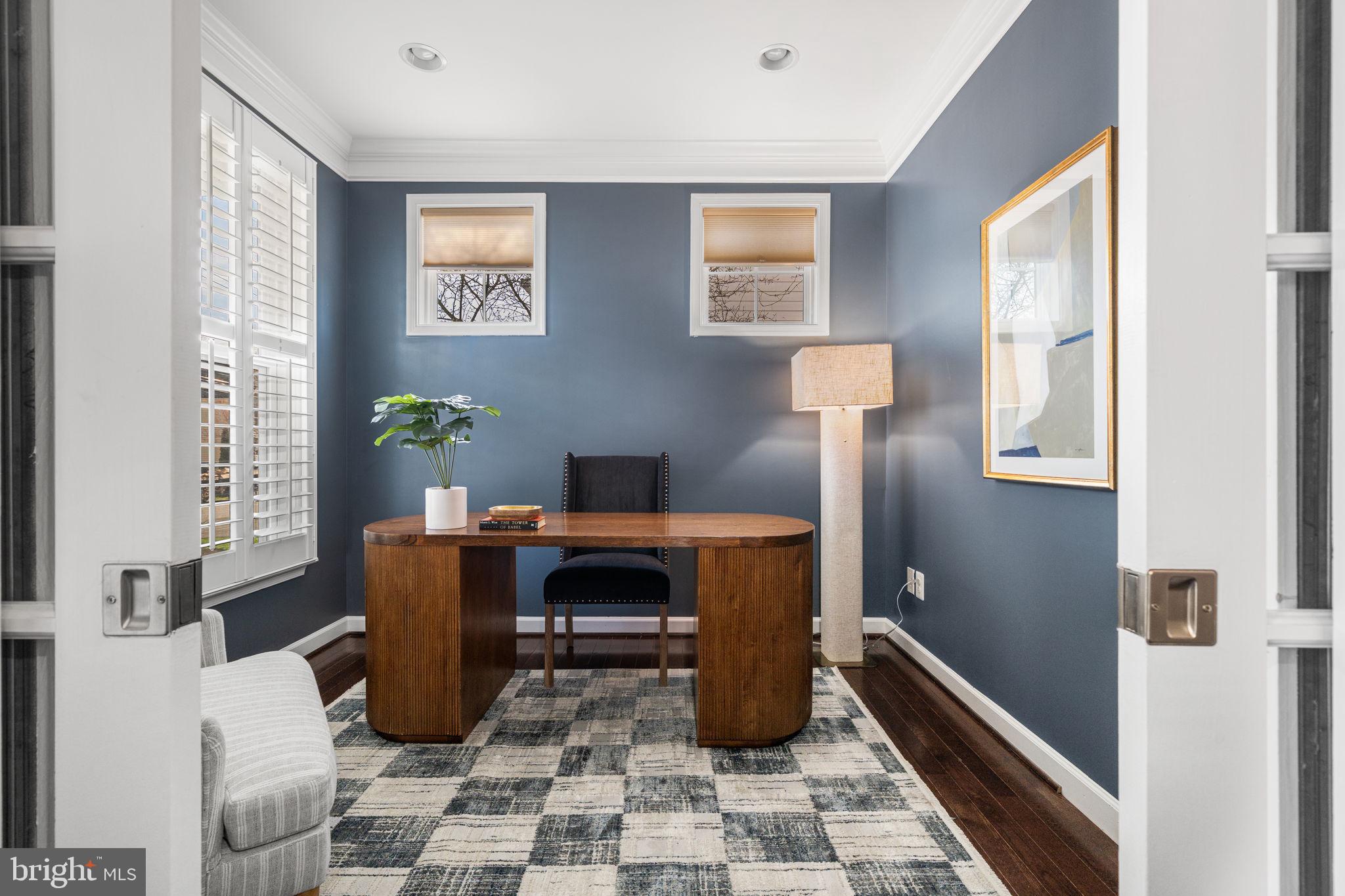 8032 Washington Road Alexandria, VA 22308 - Photo 8 of 50 a view of a workspace with furniture and a window