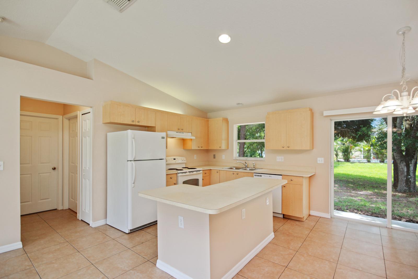 8407 Pensacola Road Fort Pierce, FL 34951 - Photo 11 of 25 10_kitchen