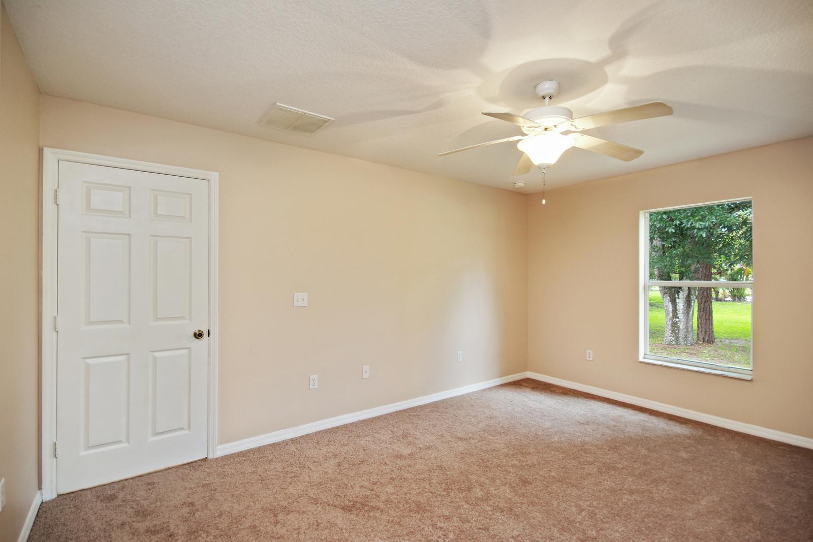 8407 Pensacola Road Fort Pierce, FL 34951 - Photo 12 of 25 11_bedroom1