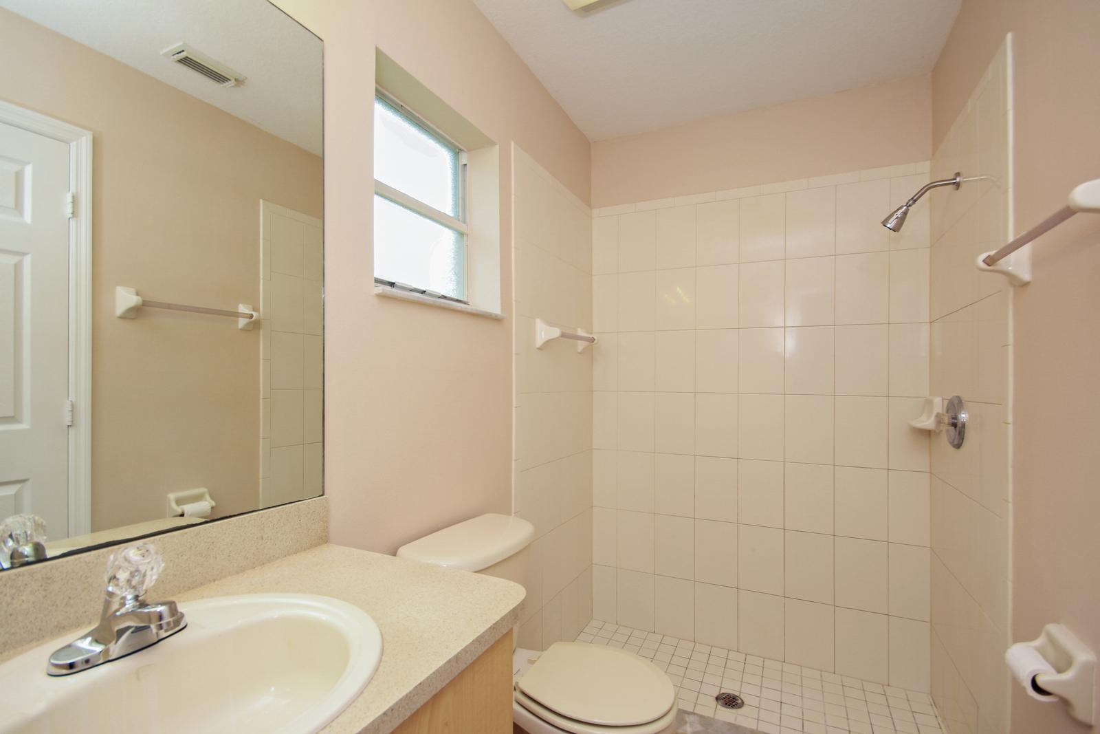 8407 Pensacola Road Fort Pierce, FL 34951 - Photo 14 of 25 13_bathroom1