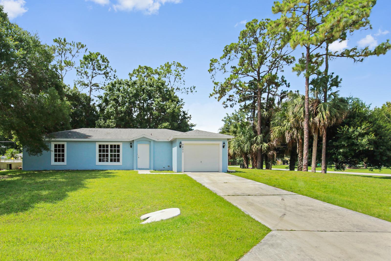 8407 Pensacola Road Fort Pierce, FL 34951 - Photo 3 of 25 2_front_facade