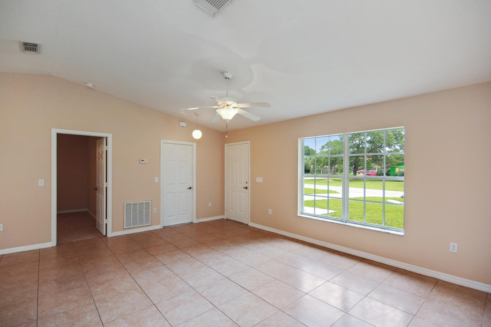 8407 Pensacola Road Fort Pierce, FL 34951 - Photo 5 of 25 4_living_room