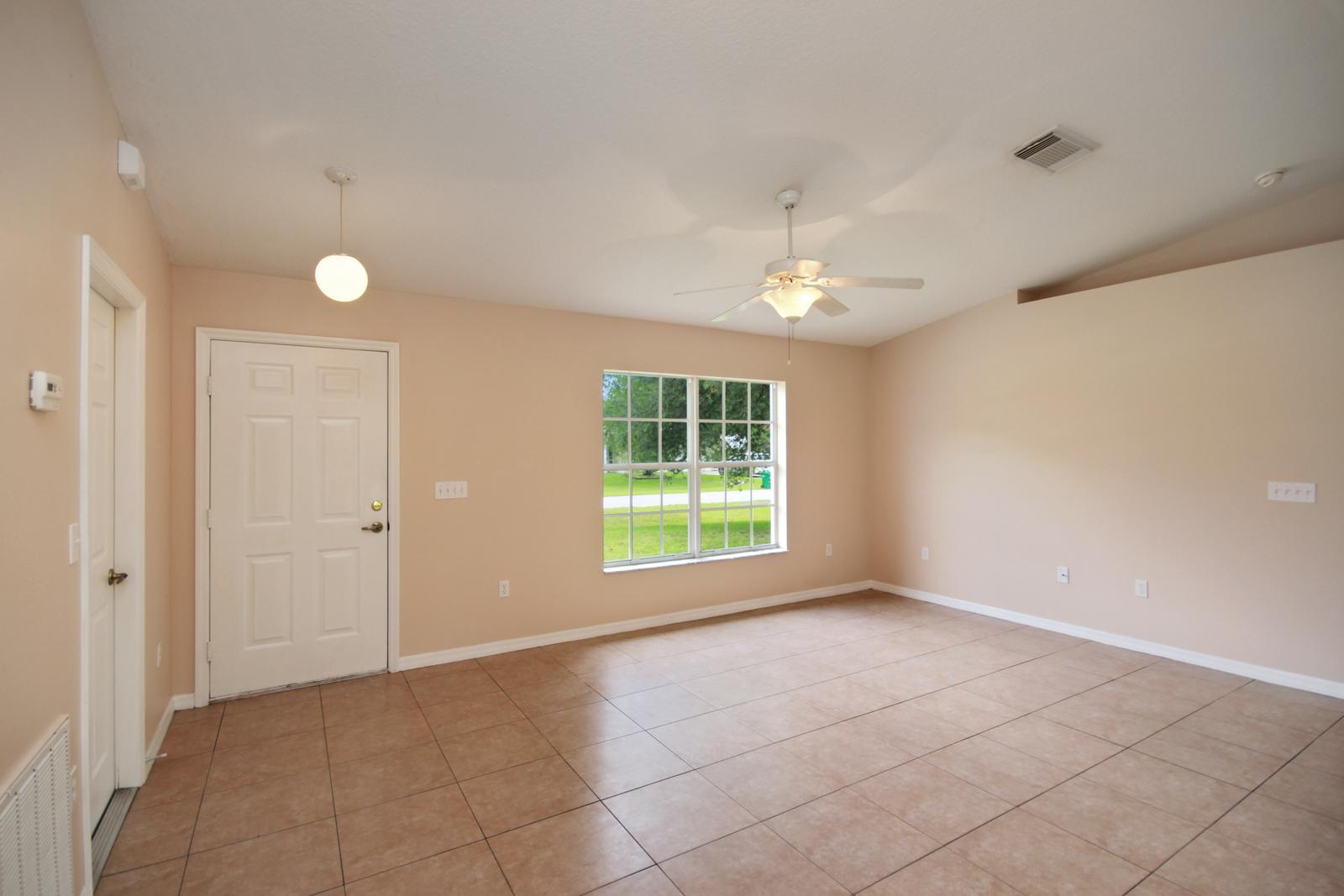 8407 Pensacola Road Fort Pierce, FL 34951 - Photo 7 of 25 6_living_room