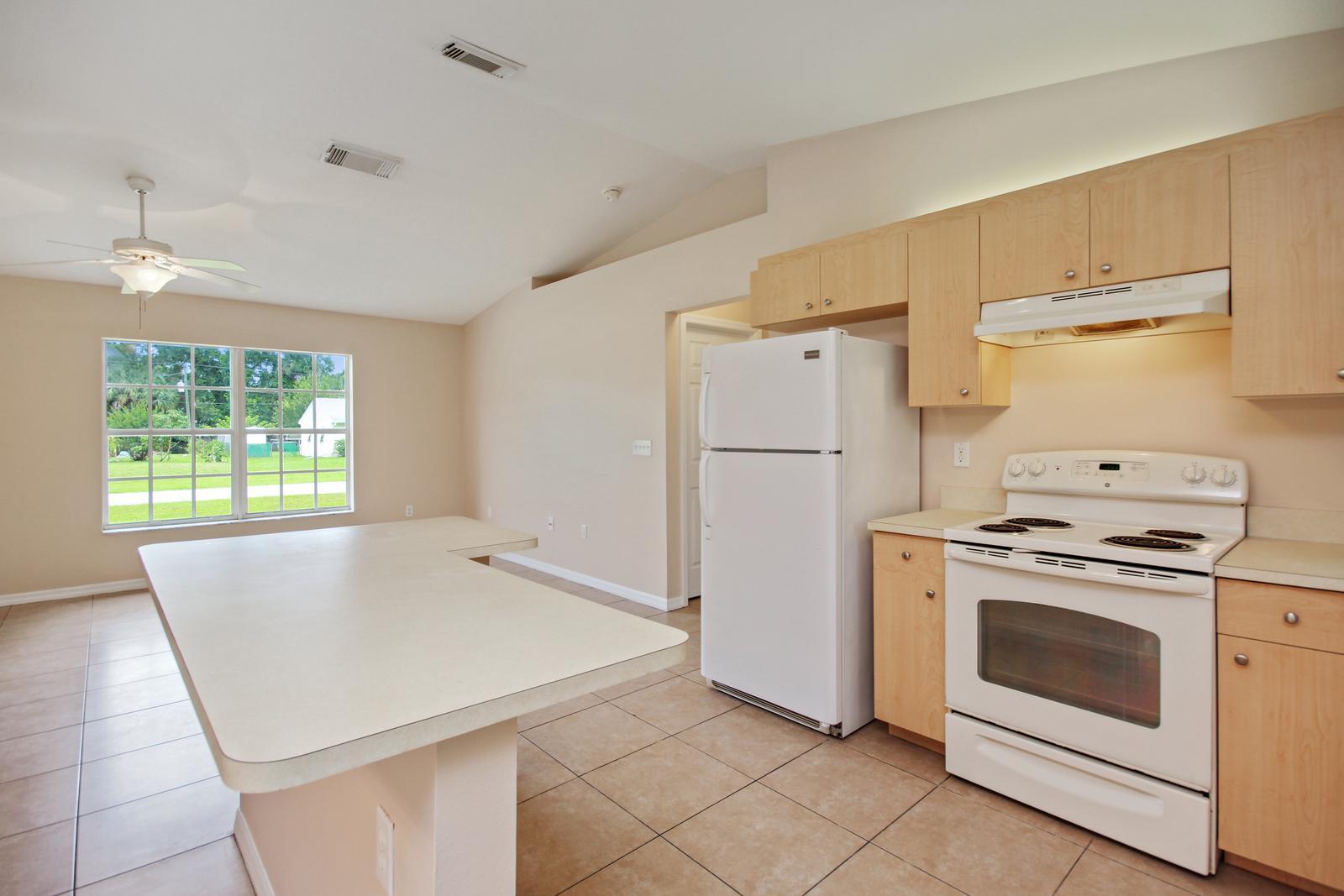 8407 Pensacola Road Fort Pierce, FL 34951 - Photo 9 of 25 8_kitchen