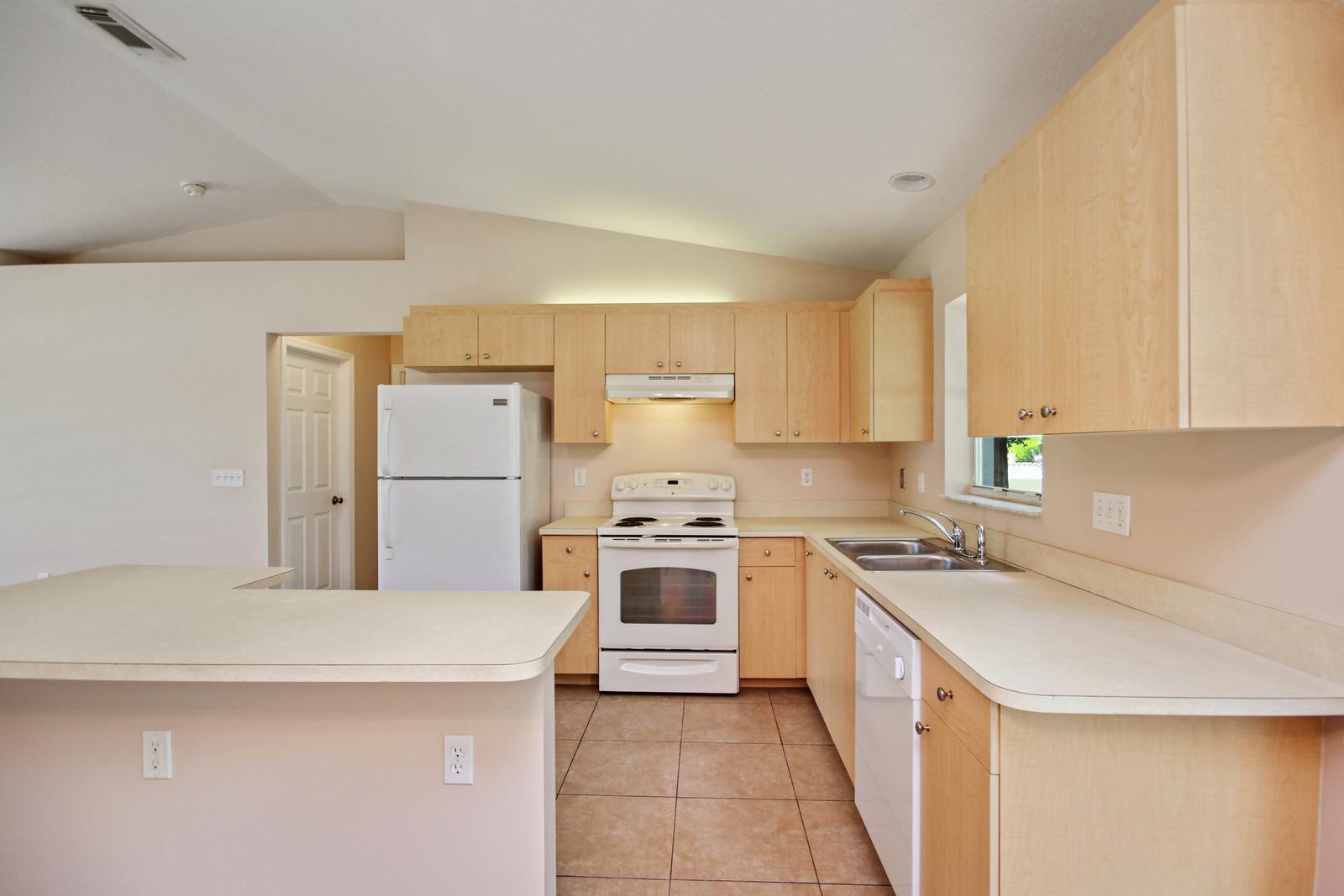 8407 Pensacola Road Fort Pierce, FL 34951 - Photo 10 of 25 9_kitchen