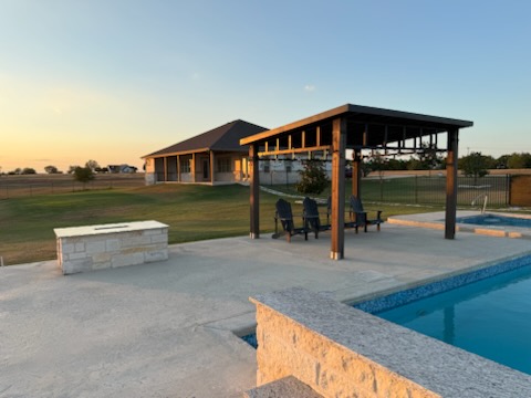 474 Peck Street Kyle, TX 78640 - Photo 2 of 15 a view of a house with a yard