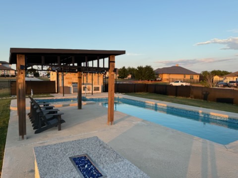 474 Peck Street Kyle, TX 78640 - Photo 3 of 15 a view of a terrace with chairs