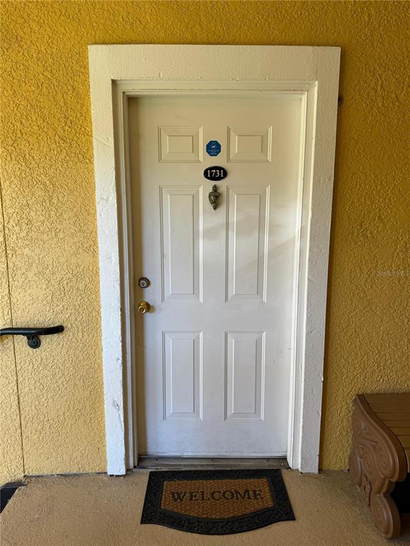 3707 Conroy Road, Unit 1731 Orlando, FL 32839 - Photo 3 of 40 a view of front door of house