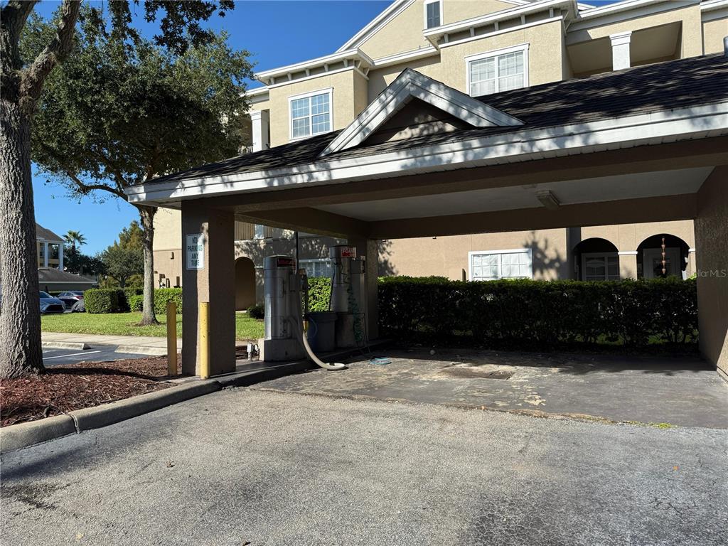 3707 Conroy Road, Unit 1731 Orlando, FL 32839 - Photo 35 of 40 a view of a car park in front of a building