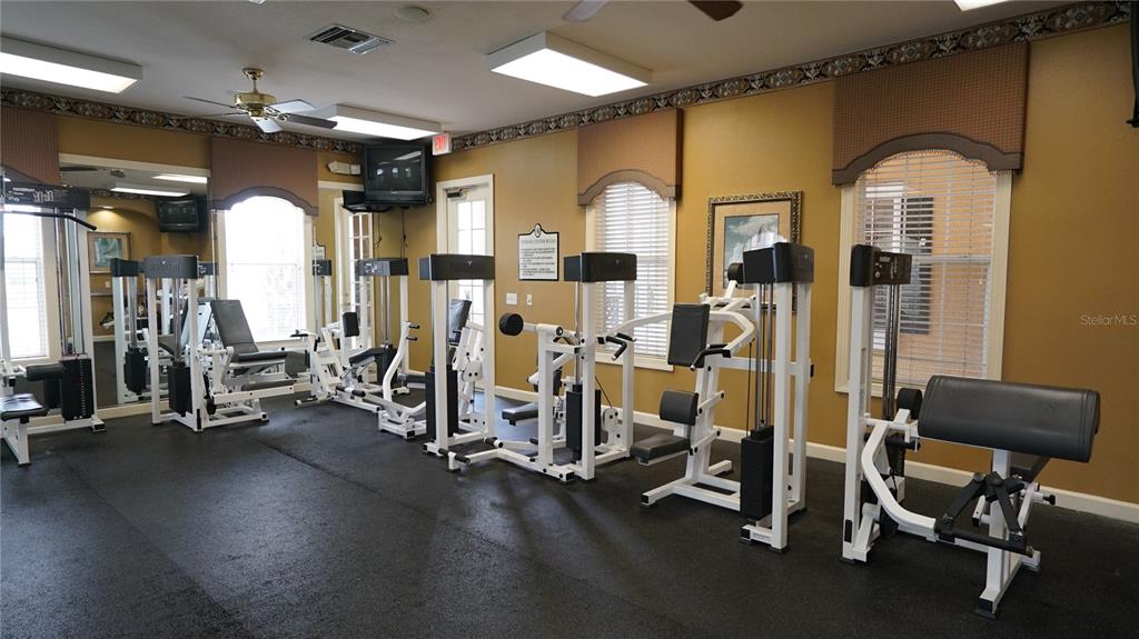 3707 Conroy Road, Unit 1731 Orlando, FL 32839 - Photo 38 of 40 a view of a room with gym equipment