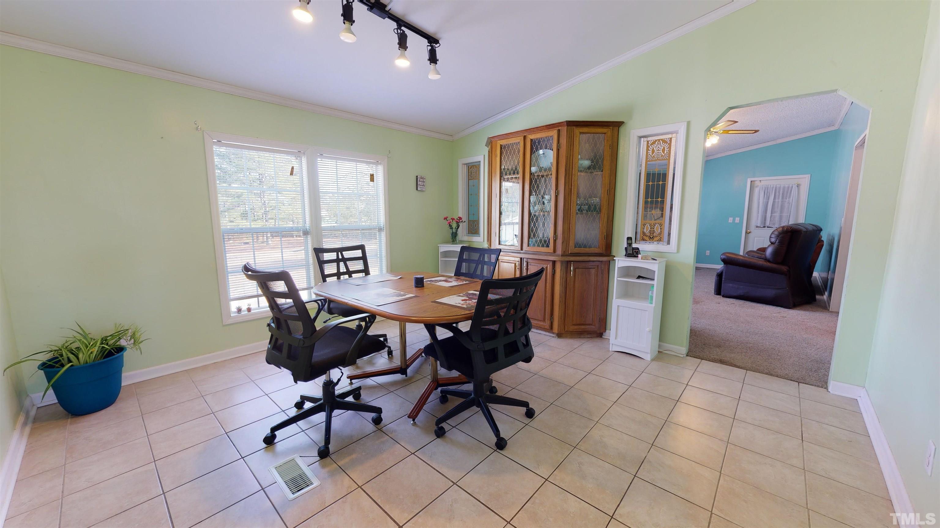 1229 Tingen Road Broadway, NC 27505 - Photo 6 of 17 a view of a dining room with furniture