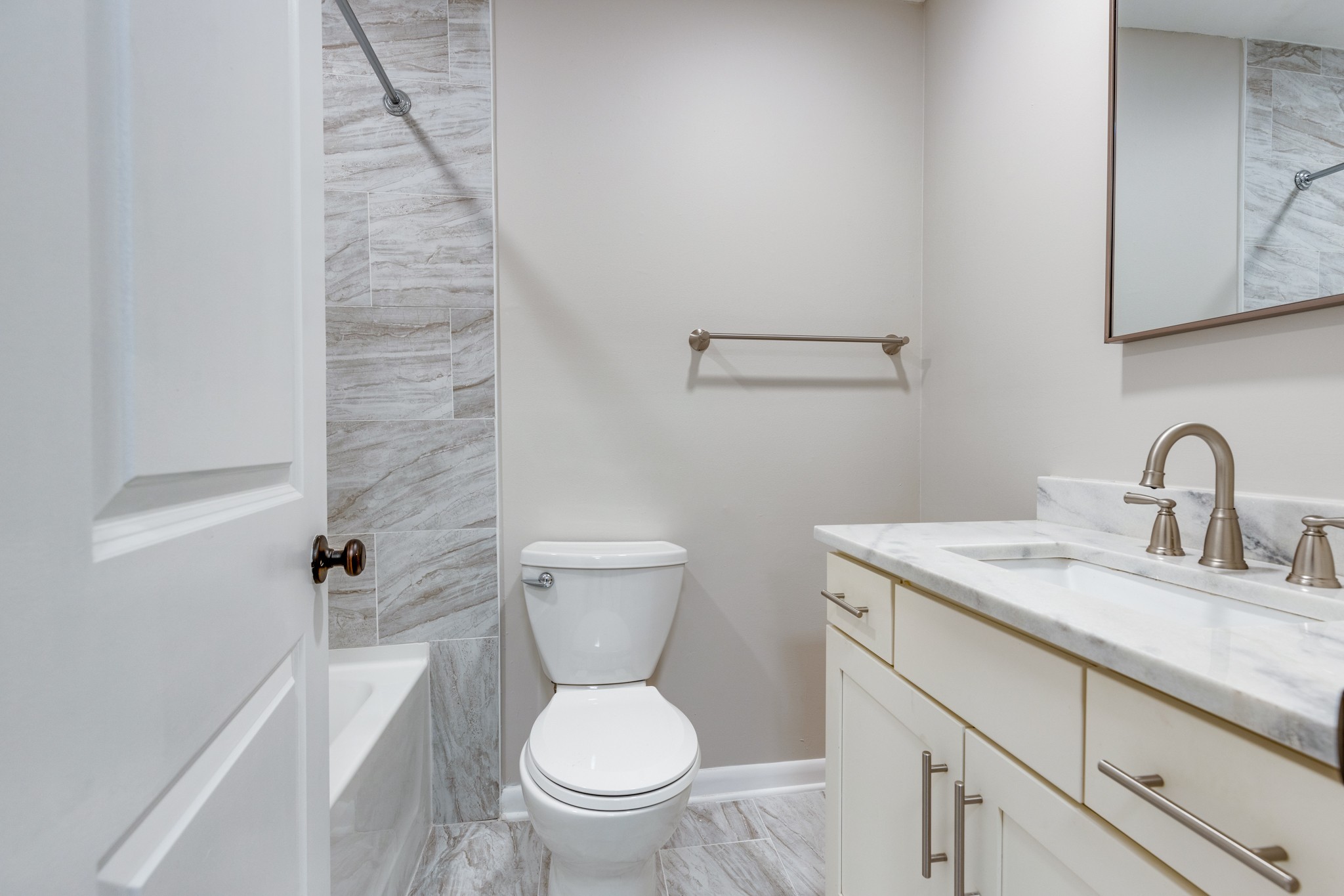 2004 Granville Road Franklin, TN 37064 - Photo 18 of 37 a bathroom with a granite countertop toilet and a sink