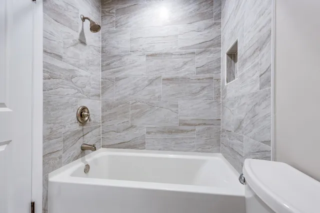 a bathroom with a bathtub