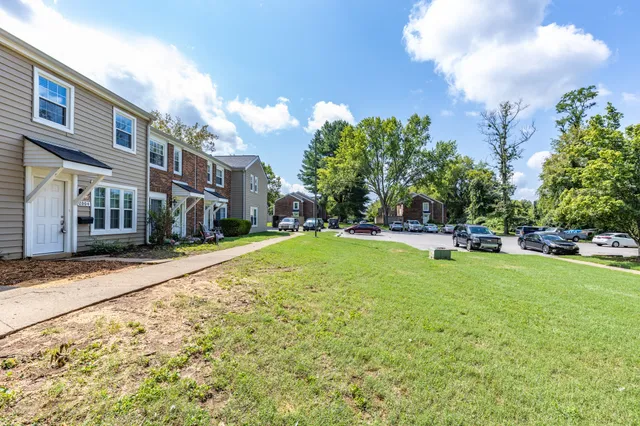 a view of outdoor space with garden and trees