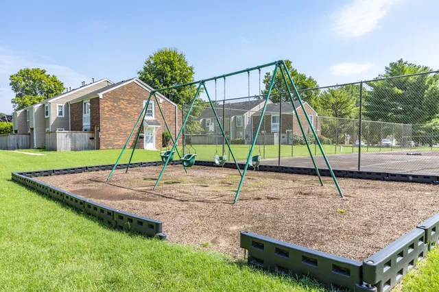 a view of a house with a park
