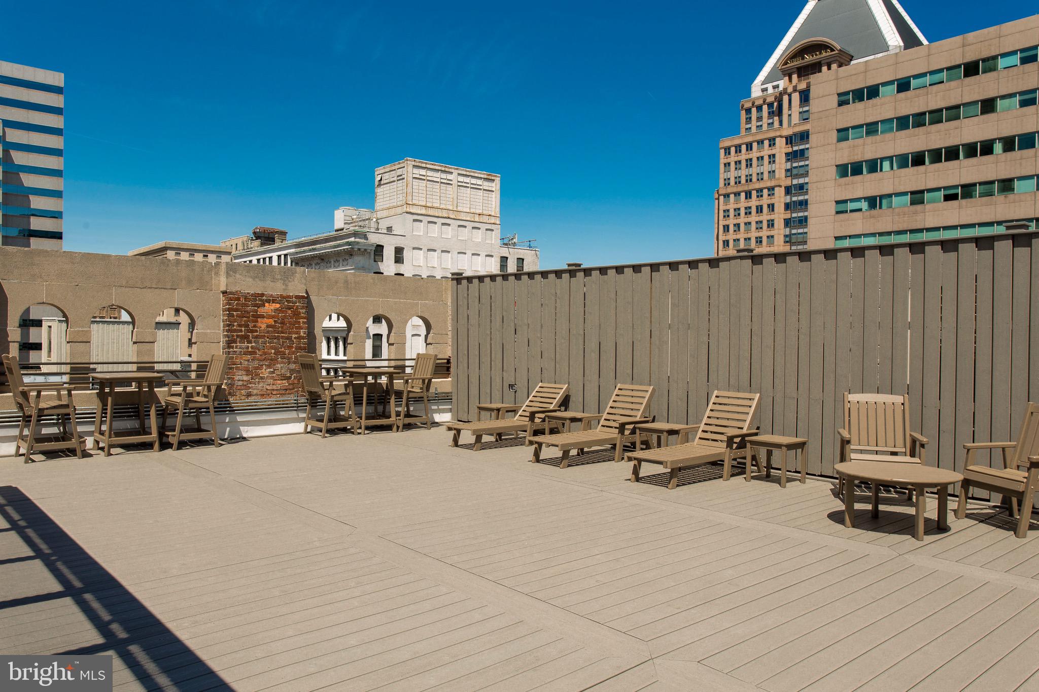 26 South Calvert Street, Unit 2BR Baltimore, MD 21202 - Photo 19 of 83 a view of a terrace with chairs