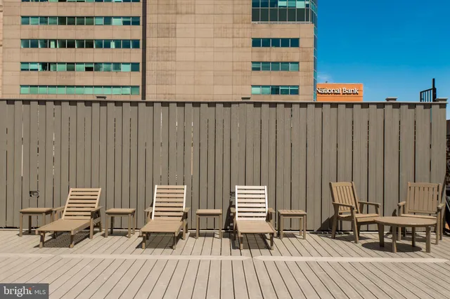 a bedroom with a bed and a lamp