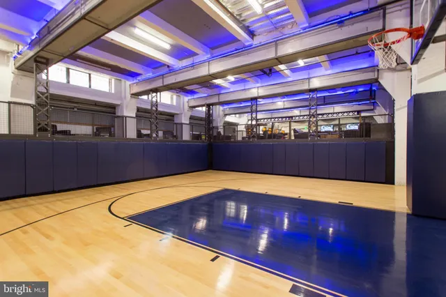 a bathroom with a sink and a large mirror