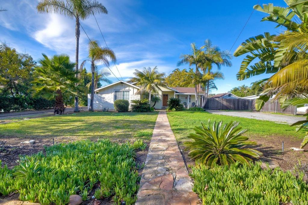 1328 Pine Avenue Carlsbad, CA 92008 - Photo 2 of 48 a view of a house with a big yard