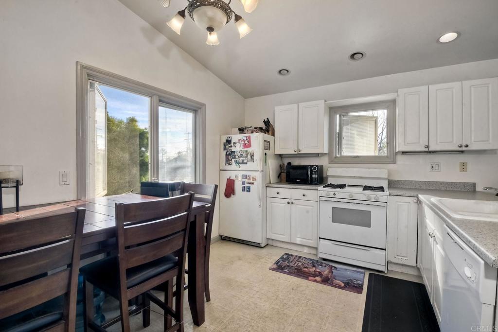 1328 Pine Avenue Carlsbad, CA 92008 - Photo 29 of 48 a kitchen that has a cabinets counter space and appliances
