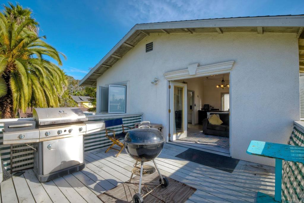 1328 Pine Avenue Carlsbad, CA 92008 - Photo 36 of 48 a kitchen with a sink and cabinets