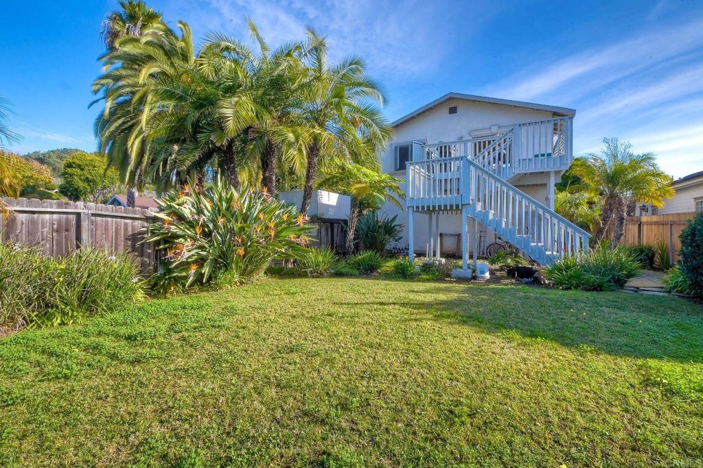 1328 Pine Avenue Carlsbad, CA 92008 - Photo 37 of 48 a front view of a house with garden