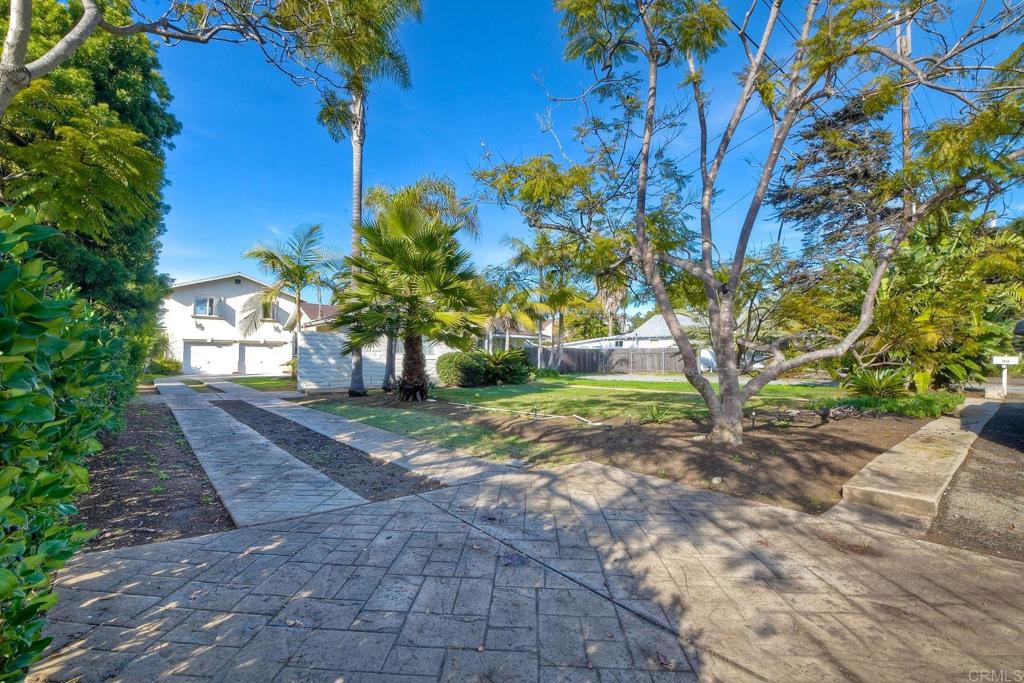 1328 Pine Avenue Carlsbad, CA 92008 - Photo 39 of 48 a view of a yard with plants and trees