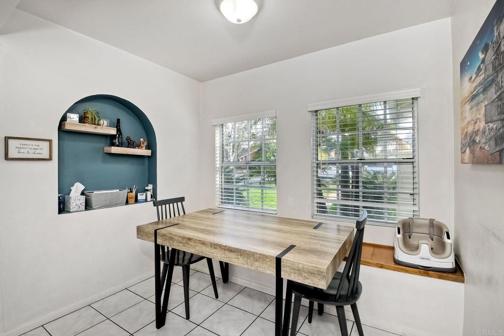 1328 Pine Avenue Carlsbad, CA 92008 - Photo 9 of 48 a view of a dining room with furniture window and outside view