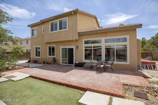 a view of a door with a tree