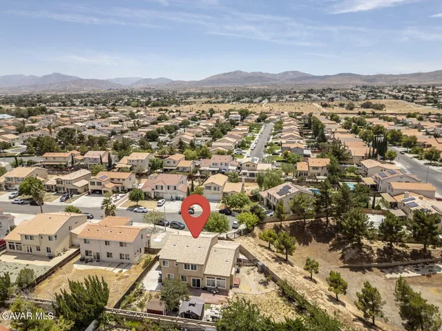 an aerial view of a city with lots of residential buildings
