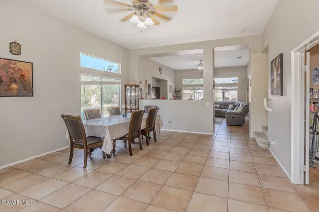 a view of a dining room with furniture
